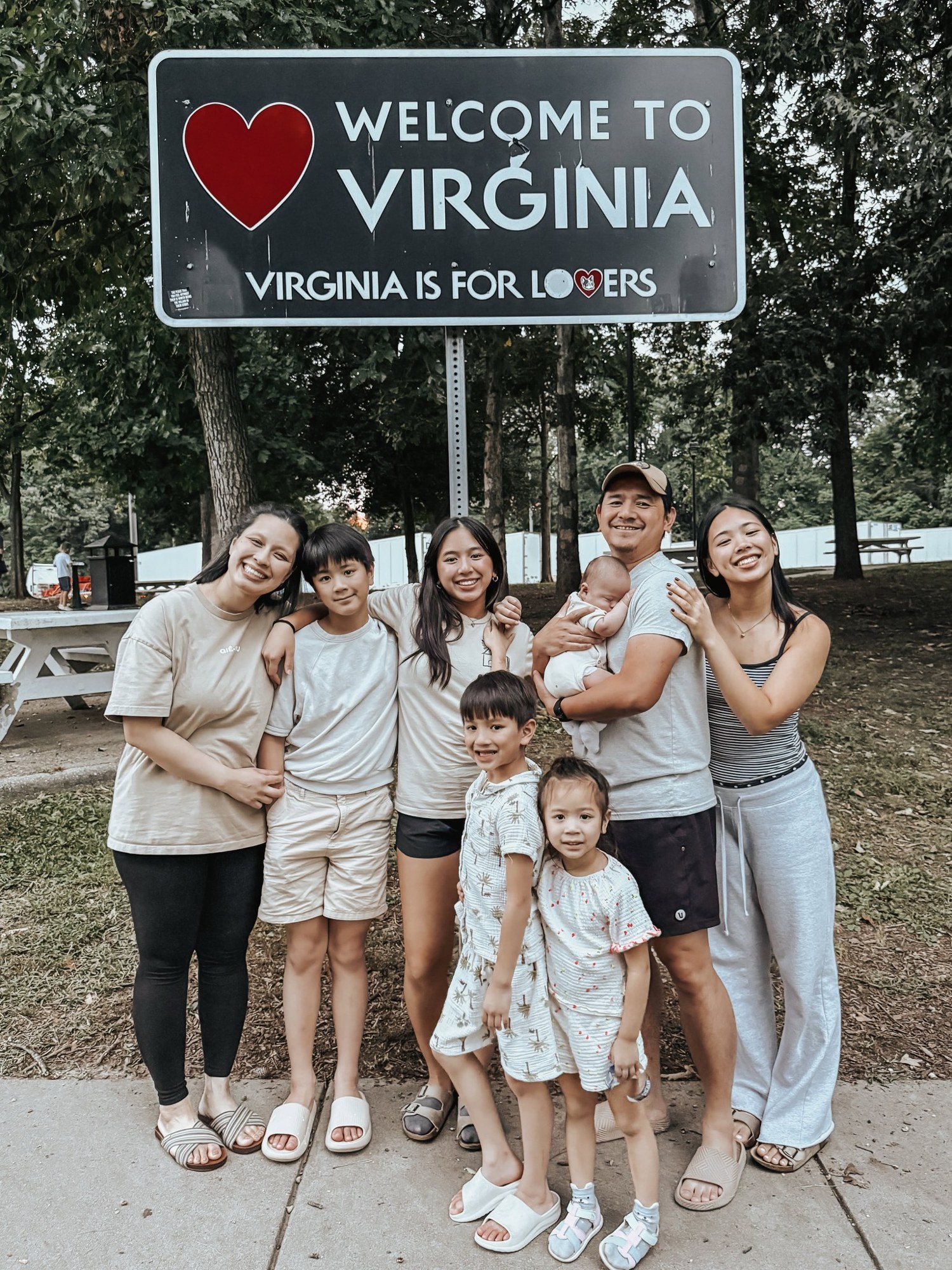 Pastor Ken and TV Tran with their six children, including baby Oliver